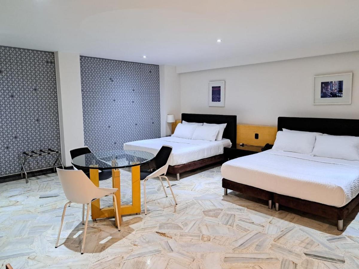 Aw Hotel Luxor Versalles Кали Екстериор снимка